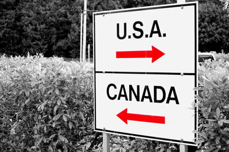 U.S. and Canada directional signs representing U.S.-situs property for Canadian residents